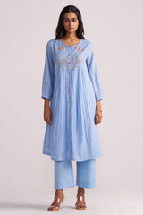 Woman wearing a Airy Blue Mul-Chanderi Co-ord Set on a white background