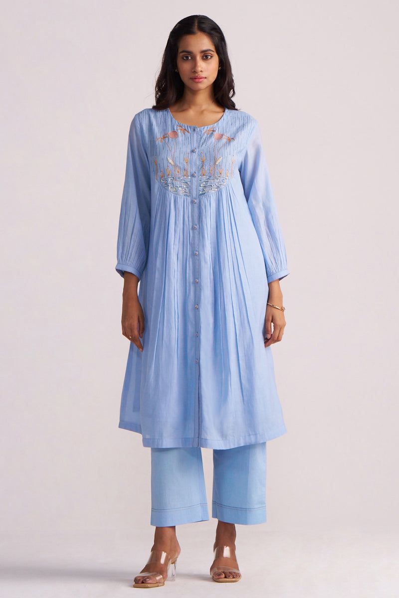 Woman wearing a Airy Blue Mul-Chanderi Co-ord Set on a white background