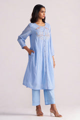 Woman wearing a Airy Blue Mul-Chanderi Co-ord Set on a white background