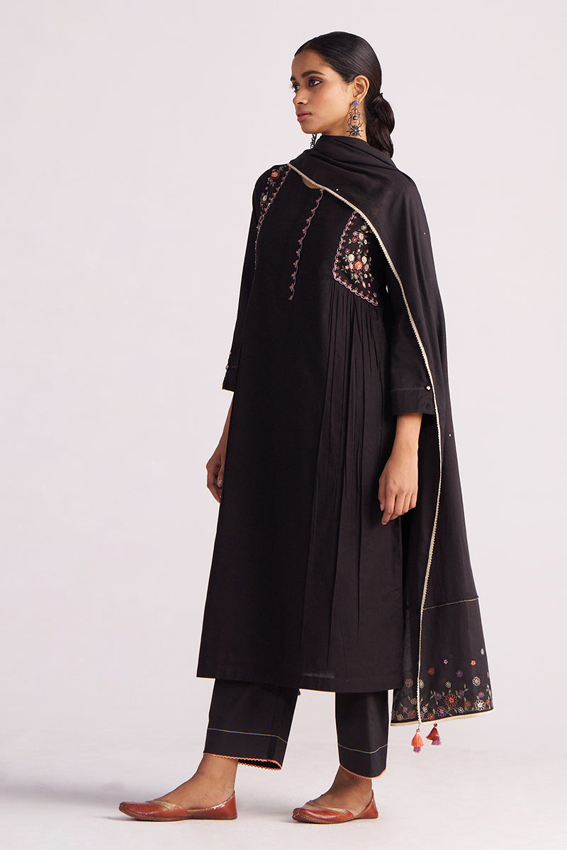 Woman wearing a Black Embroidered Kurta Set on a white background