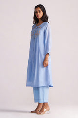 Woman wearing a Airy Blue Mul-Chanderi Co-ord Set on a white background