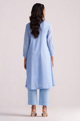 Woman wearing a Airy Blue Mul-Chanderi Co-ord Set on a plain background