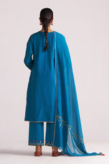 Woman wearing a Celestial Blue Embroidered Kurta Set on a white background