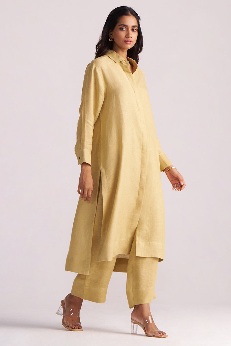Woman wearing a Fall Leaf Pure Linen Co-ord Set on a light gray background