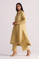 Woman wearing a Fall Leaf Pure Linen Co-ord Set on a light gray background