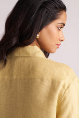 Woman wearing a Fall Leaf Pure Linen Co-ord Set against a plain background