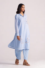 Woman wearing a Soft Sky Blue Mul-Mul Co-ord Set on a white background