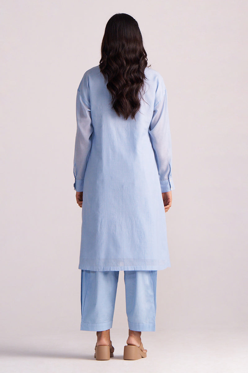 Woman wearing a Soft Sky Blue Mul-Mul Co-ord Set on a plain background