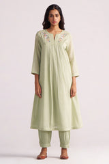 Woman wearing a Quient Green Mul-Mul Co-ord Set on a white background
