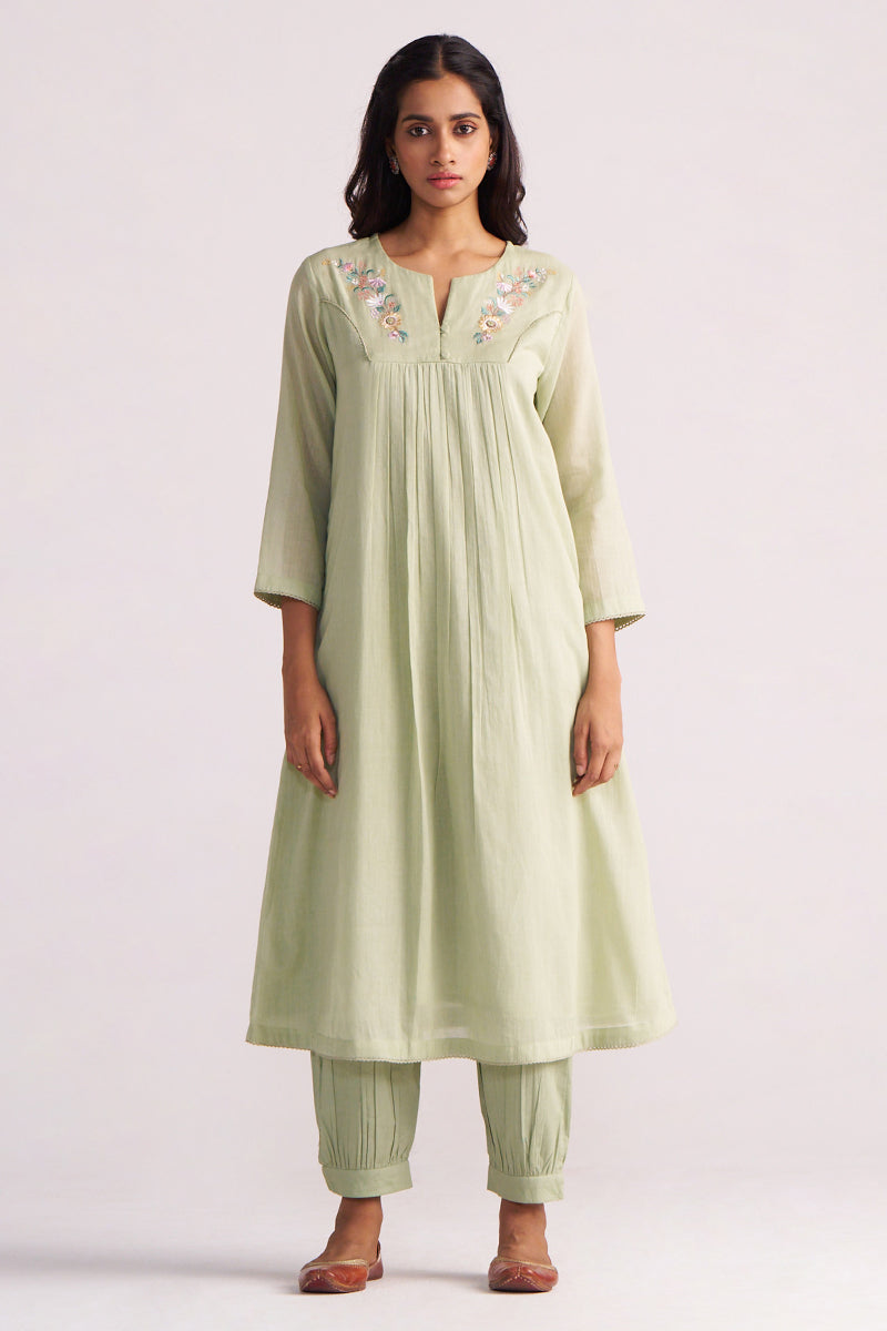 Woman wearing a Quient Green Mul-Mul Co-ord Set on a white background
