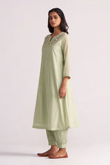 Woman wearing a Quient Green Mul-Mul Co-ord Set on a white background