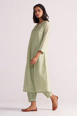 Woman wearing a Quient Green Mul-Mul Co-ord Set on a white background