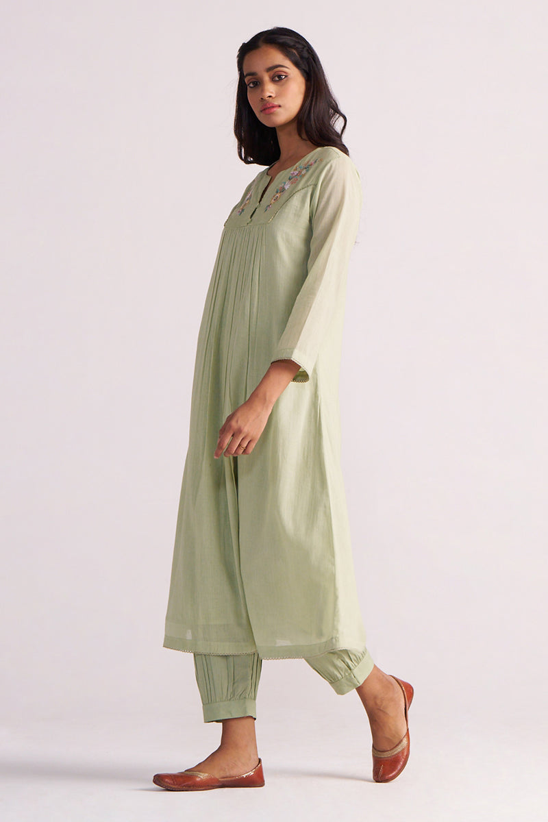 Woman wearing a Quient Green Mul-Mul Co-ord Set on a white background