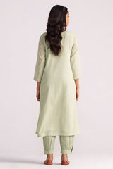 Woman wearing a Quient Green Mul-Mul Co-ord Set on a white background