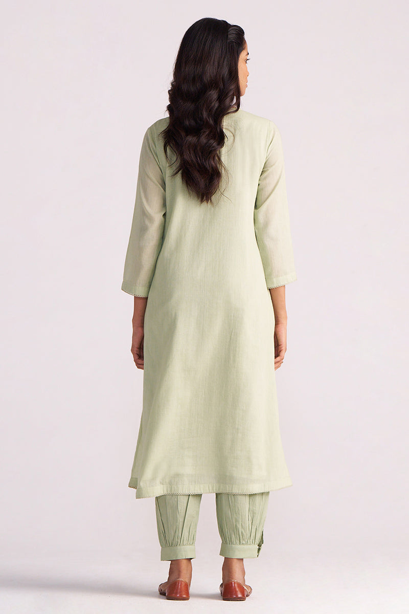 Woman wearing a Quient Green Mul-Mul Co-ord Set on a white background