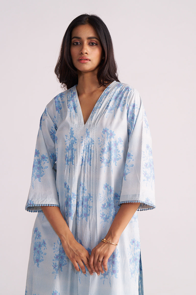 Woman wearing a Cream and Dusty Blue Hand-Print Cotton Co-ord Set against a white background