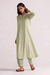 Woman wearing a Quient Green Mul-Mul Co-ord Set on a white background