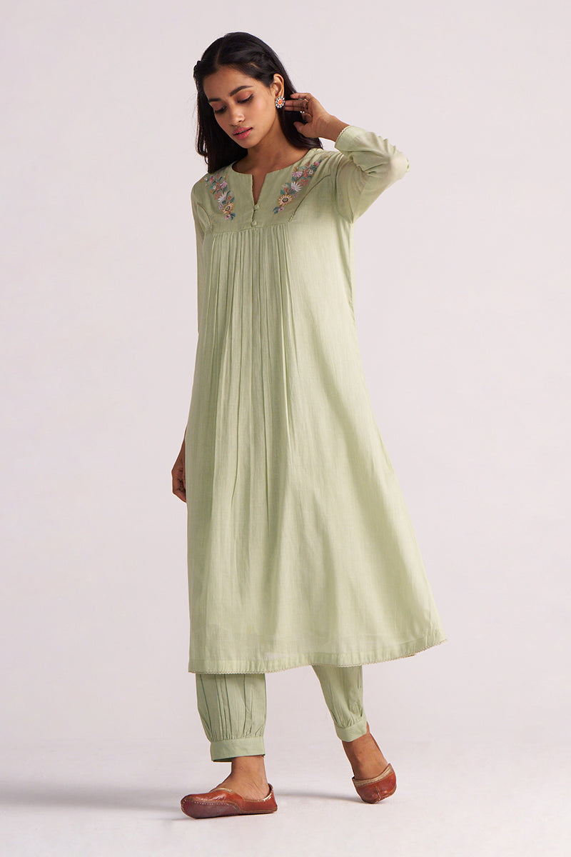 Woman wearing a Quient Green Mul-Mul Co-ord Set on a white background