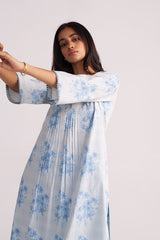 Woman wearing a Cream and Dusty Blue Hand-Print Cotton Co-ord Set with a plain background