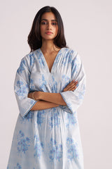 Woman wearing a Cream and Dusty Blue Hand-Print Cotton Co-ord Set a white background
