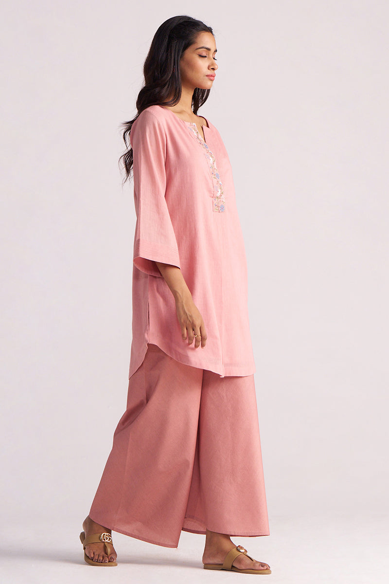 Woman wearing a Rose Tan Mul-Mul Co-ord Set with a plain background