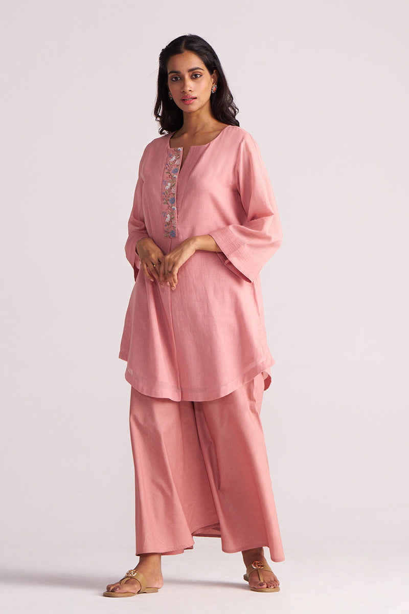 Woman wearing a Rose Tan Mul-Mul Co-ord Set with a plain background