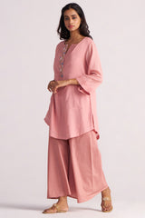 Woman wearing a Rose Tan Mul-Mul Co-ord Set with a plain background