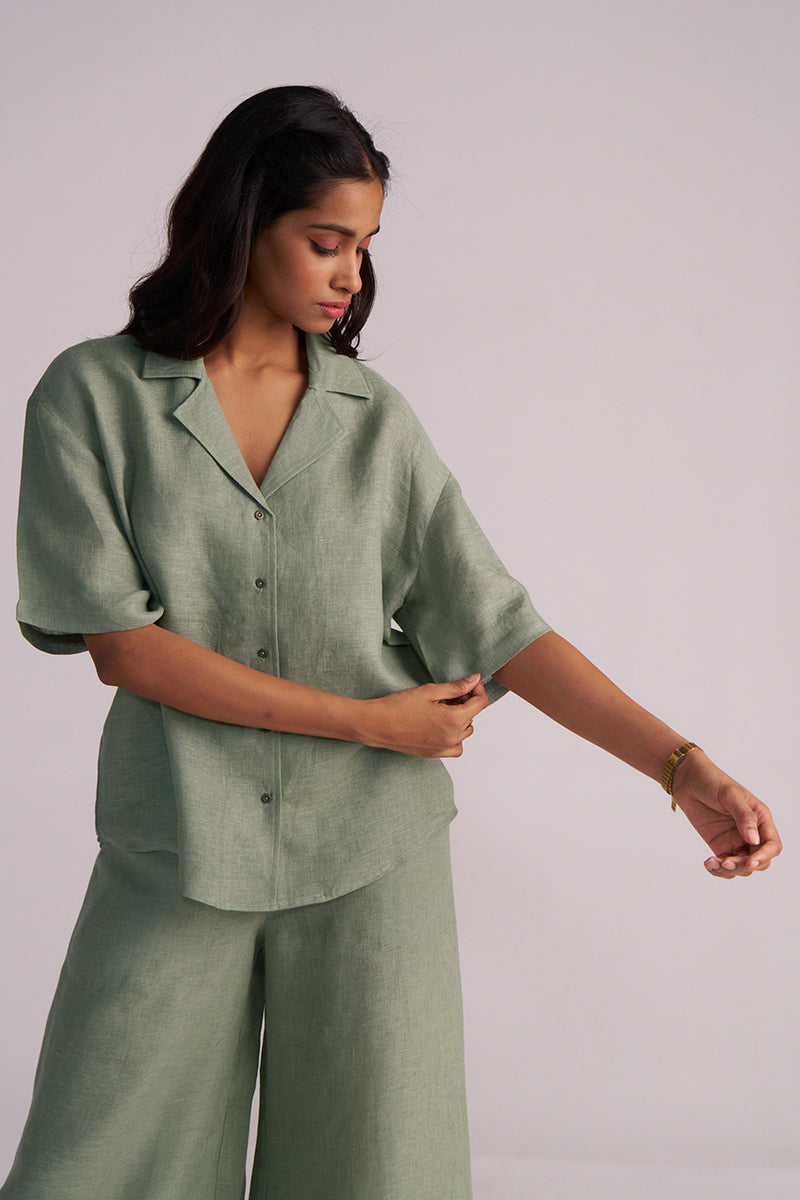 Woman wearing a Lily Pad Green Pure Linen Co-ord Set against a plain background