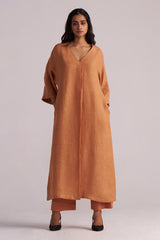Woman wearing a Sunburn Pure Linen Co-ord Set a plain background