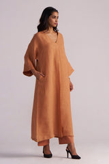 Woman wearing a Sunburn Pure Linen Co-ord Set against a plain background