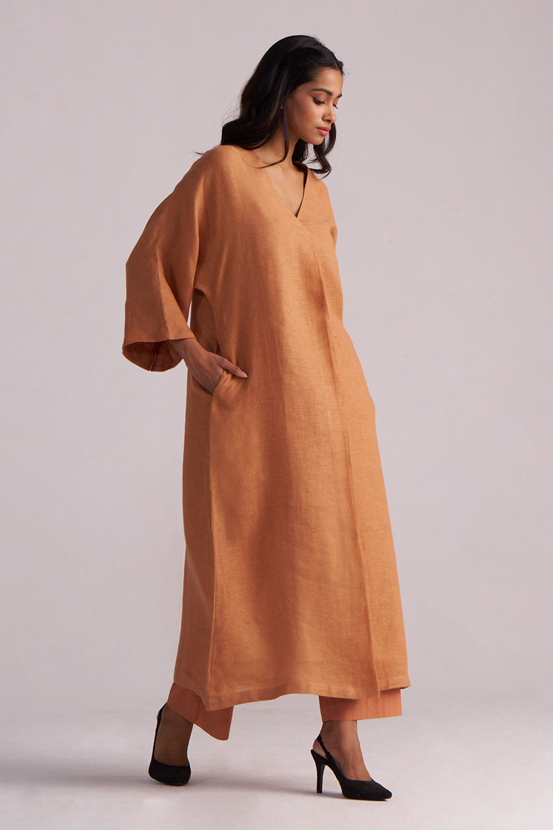 Woman wearing a Sunburn Pure Linen Co-ord Set against a plain background