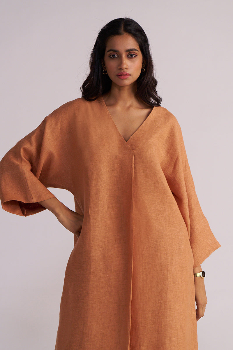 Woman wearing a Sunburn Pure Linen Co-ord Set a plain background