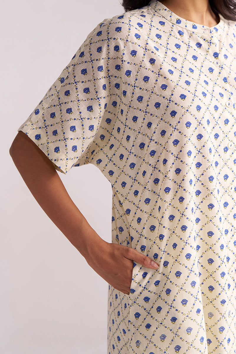 Person wearing a Cream and Blue Small Flower Hand-Print Cotton Linen Co-ord Set on a plain background
