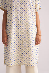 Cream and Blue Small Flower Hand-Print Cotton Linen Co-ord Set worn by a person on a light gray background
