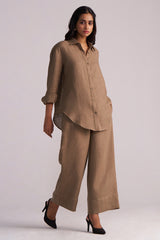 Woman wearing a Woodsmoke Brown Pure Linen Co-ord Set on a plain background