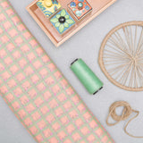Peach Checkered Screen Printed Cotton Fabric.