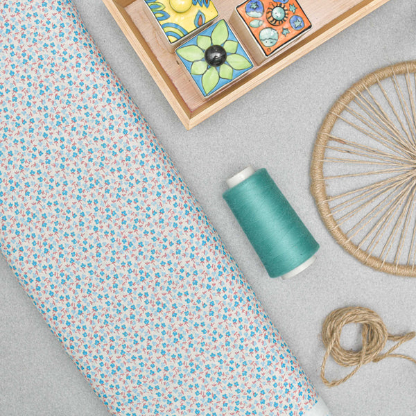 White and Blue Small Floral Screen Printed Cotton Fabric